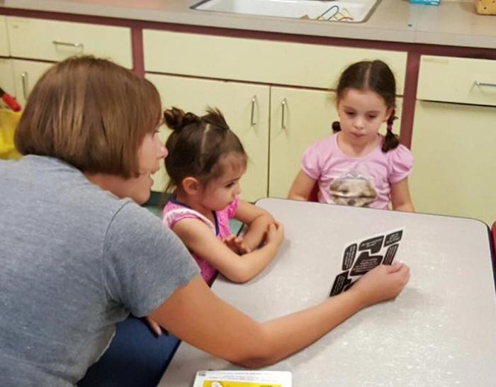 Amy Reed-Sandoval using the methods of philosophy to encourage children to think through big questions at Rayito del Sol Daycare and Learning Center in El Paso. Photo by Iván Sandoval-Cervantes. Amy Reed-Sandoval using the methods of philosophy to encourage children to think through big questions at Rayito del Sol Daycare and Learning Center in El Paso. Photo by Iván Sandoval-Cervantes.