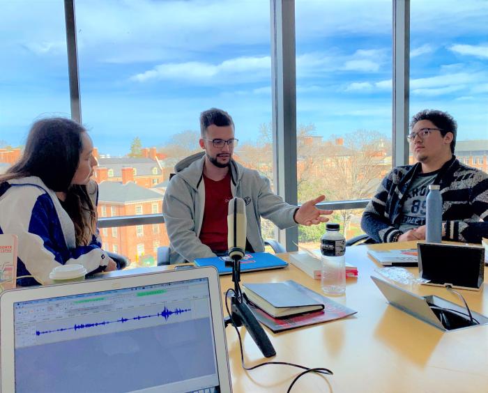 Daisy Almonte, Axel Herrera, and Bryan Mejía, North Carolina-raised Latinx students, record the “Nuestro South” podcast in a room at U.N.C.-Chapel Hill.