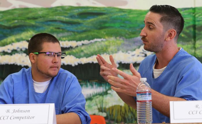 Incarcerated students participating in the Humanities Beyond Bars ethics bowl debate program at Tehachapi Prison, CA. Photo by Alex Horvath for The Bakersfield Californian.