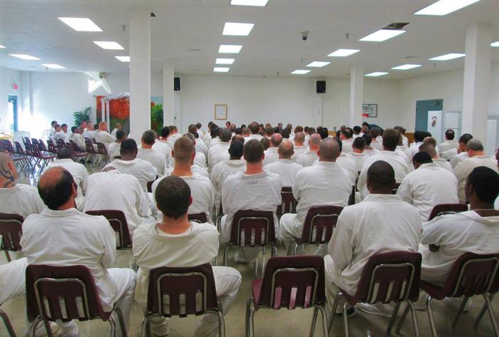 Inmates attend a staged reading at the Randall L. Williams Correction Center in Pine Bluff, AR