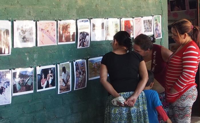 A younger generation learns about the refugee experience through photographs and family memories - photo by Molly Todd